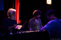 DJs in dark club